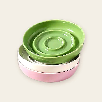 Pile de bols en ceramique a anneaux concentriques, vert, blanc et rose