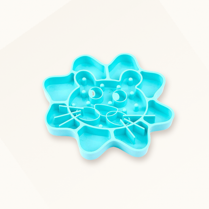 Gamelle anti-glouton en silicone turquoise en forme de visage de chat, vue de trois quarts